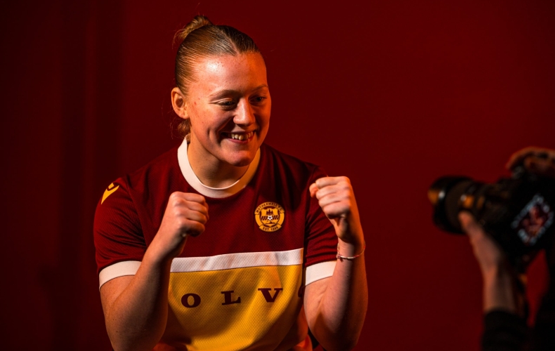 Amy Sharkey is staying in claret and amber