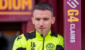 Paul McGinn ahead of Hibernian